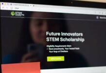 Scholarships Every Woman in STEM Should Apply For A blurry image of a laptop screen with a STEM scholarship site and a sticky note that reads "You Got This, Idiot."