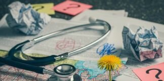 A State-by-State Guide to Reproductive Laws in America A crumpled map with a stethoscope, legal papers, and a dandelion.