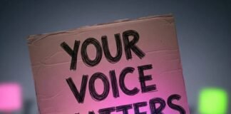 From Petition to Policy: Your Voice Can Make a Difference Protest sign: "Your Voice Matters" with neon megaphone and blurry crowd.